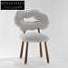 Luxurious Teddy Fabric Dining Chair with Solid Wood Legs for Modern Homes