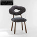 Luxurious Teddy Fabric Dining Chair with Solid Wood Legs for Modern Homes
