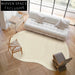 Luxury Handmade Cream Irregular Wool Area Rug for Modern Living Rooms