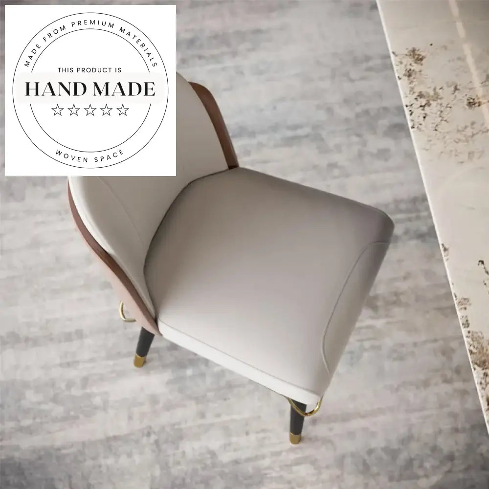 Luxury Post Modern Upholstered Leather and Stainless Steel Dining Chair