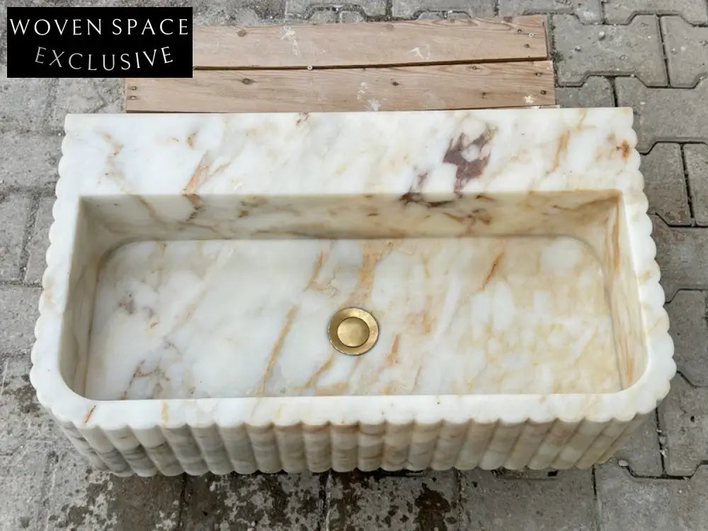 Romeo Calacatta ribbed Gold marble sink