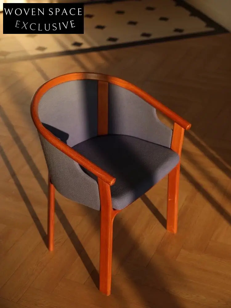 Teak Dining Chairs Inspired by Wine Barrel Design