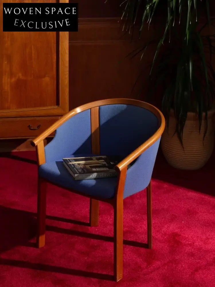 Teak Dining Chairs Inspired by Wine Barrel Design